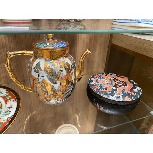 430 - 9 pieces of oriental ceramics & tin inc. teapots, satsuma vase etc.