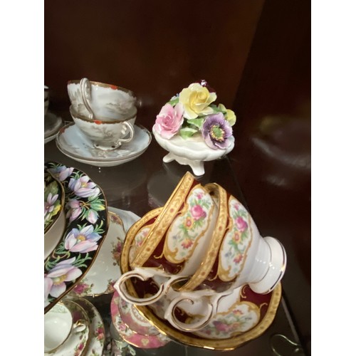 359 - 3 shelves of mainly Royal Albert cups & saucers inc. 8 pieces of 