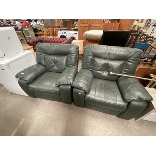 124 - Pair of green leather manual reclining armchairs 105W