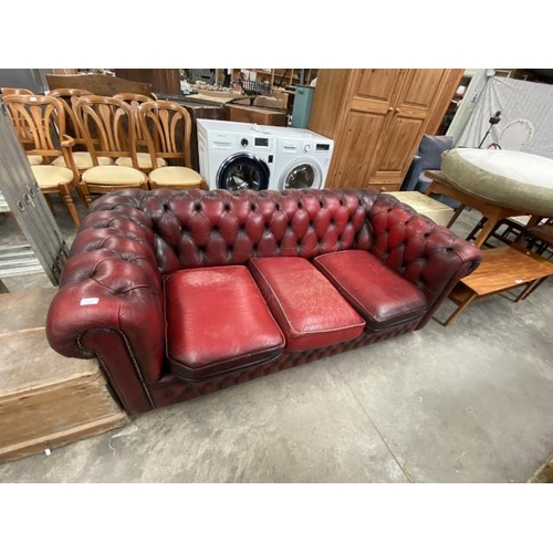 142 - Ox blood leather Chesterfield button back settee 180W (leather as found)