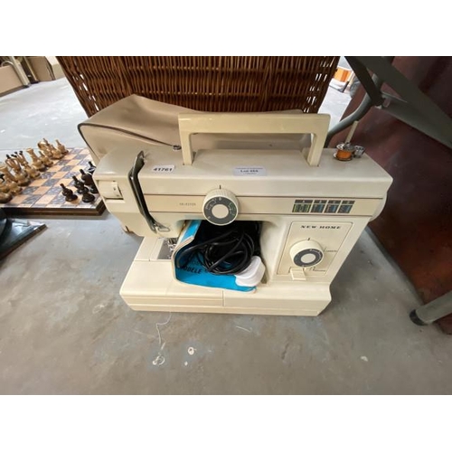 454 - New Home 106 sewing machine with cover, manual & foot pedal/mains lead