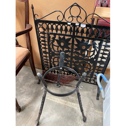 119 - Black iron fire screen and an Oriental brass topped occasional table 58H 60cm diameter