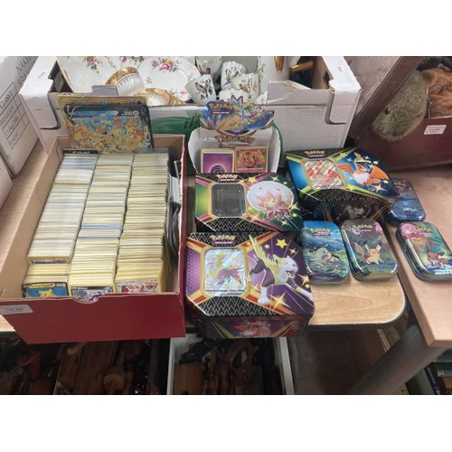 469 - Good selection of Pokémon cards - mainly 2021 & 2022, to include sealed packets and Pokemon tins (un... 