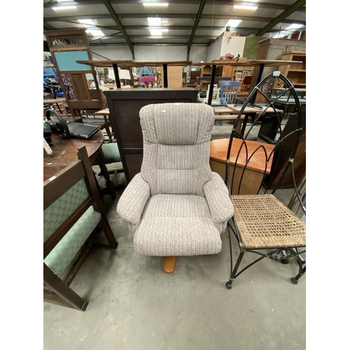 63 - Shangri-La upholstered swivel lounge chair 76W