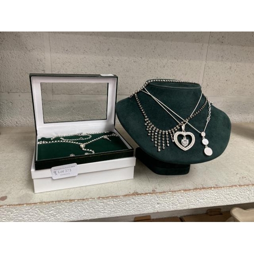 373 - Cased costume diamante necklace & matching stud earrings, 3 costume necklaces & diamante bracelet
