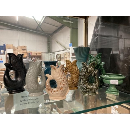 419 - 9 pieces of Dartmouth pottery inc. 6 fish vases