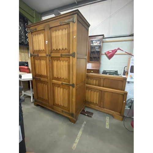 25 - Oak linen fold 2 door wardrobe 190H 127W 56D and a matching double bed frame with side irons