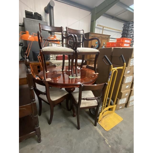 50 - Italian style mahogany dining table 81H 117cm diameter and 6 chairs including 2 carvers