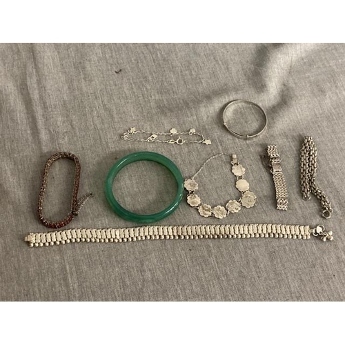 Box of silver bracelets, white metal choker necklace & jade/ green polished stone bangle