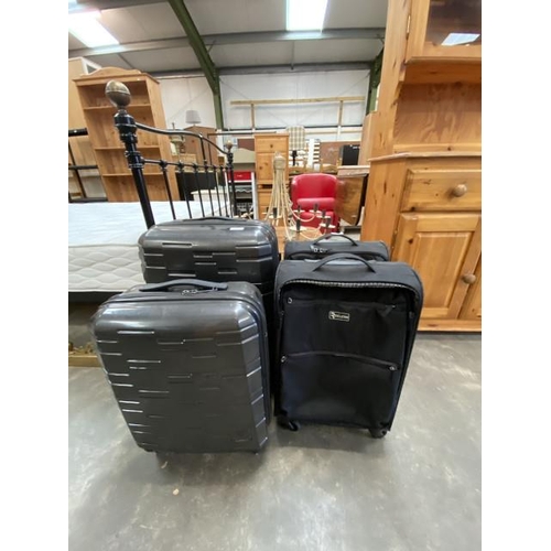 129 - 2 Antler suitcases and 2 Revelation suitcases