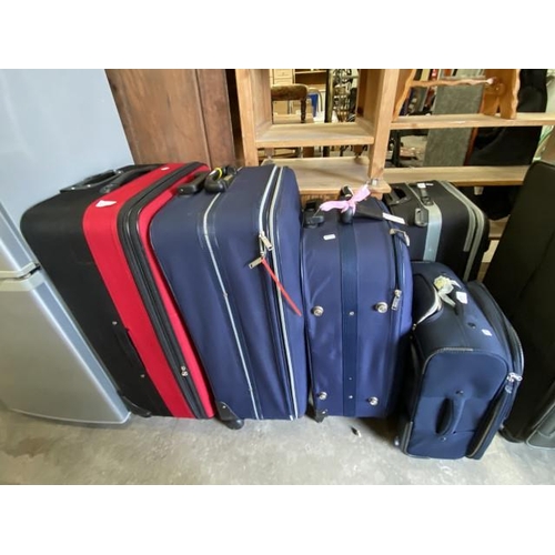 135 - 5 assorted suitcases