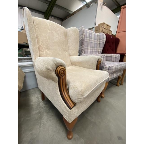 194 - Cream upholstered wing armchair 76W