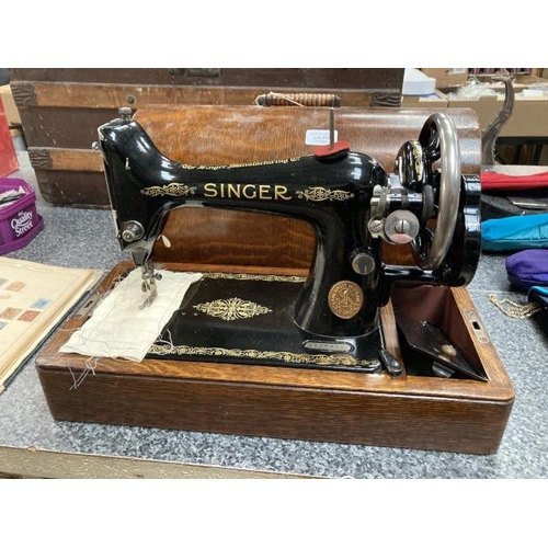 212 - Oak cased Singer Y1073702 sewing machine