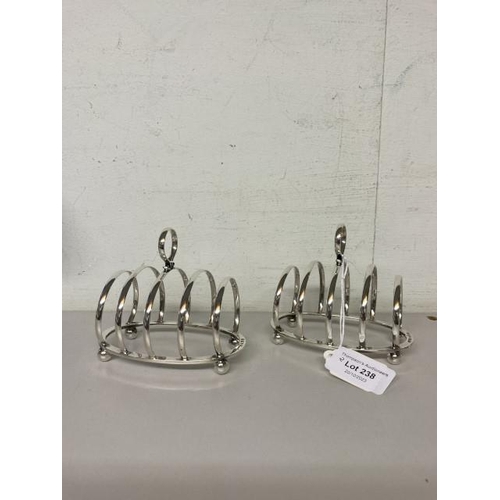 238 - Pair of G Unite & Sons &  Lyde Ltd, Birmingham 1928 silver toast racks (combined 158g)