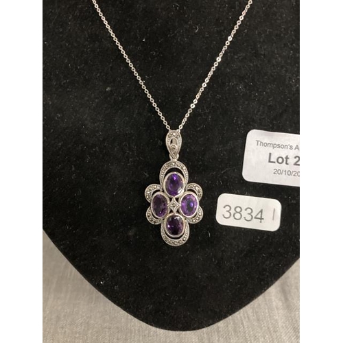 289 - Silver, marcasite & purple stone pendant on silver chain