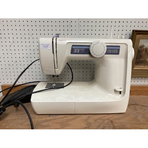 323 - Toyota model. KB13 sewing machine with foot pedal/ mains lead