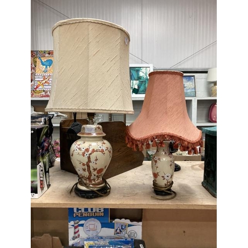 367 - 2 Chinese 'Blossom' table lamps on carved wooden stands with shades