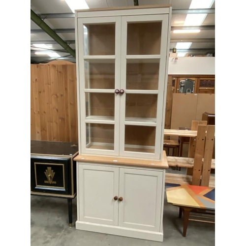 82 - Contemporary “Next” bookcase on chest 219H 93W 46D