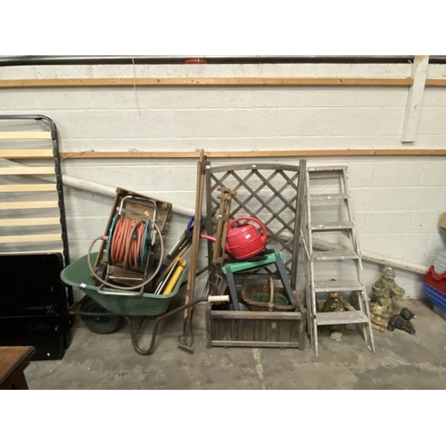 9 - Assorted garden tools, wheelbarrow, hose reel, watering can, trellis etc