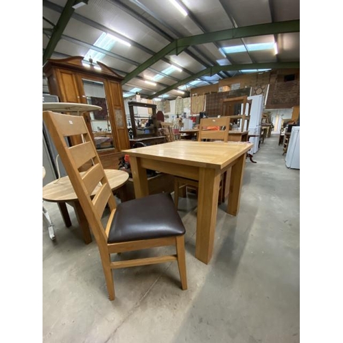 100 - Light oak kitchen table with 2 chairs 78H 90W 90D