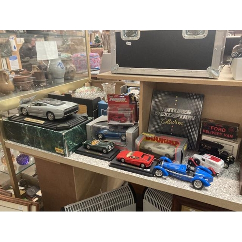 431 - 9 collectors vehicles inc. Maisto Jaguar XC220 (Boxed), Burago BMW (Boxed), Burago Ferrari Testaross... 