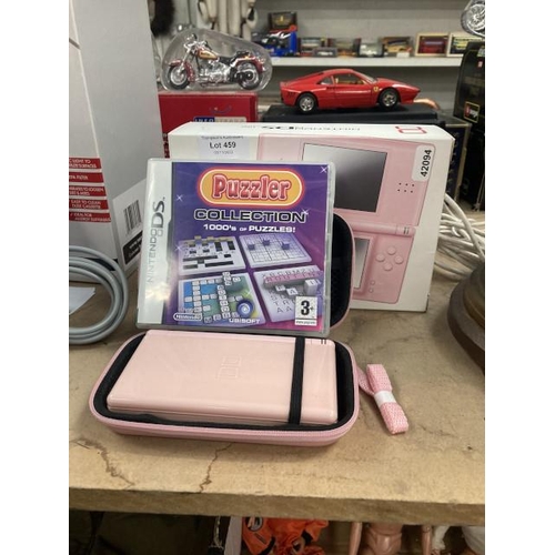 459 - Boxed Nintendo DS lite (baby pink) with case & cased Puzzler game