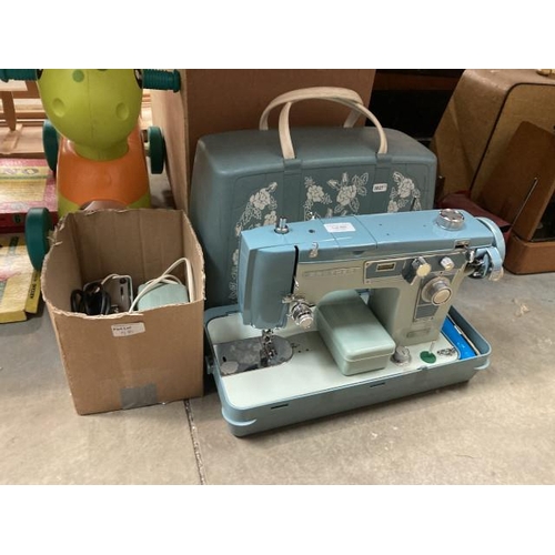 480 - Cased Brother sewing machine with foot pedal, mains lead, booklet & accessories