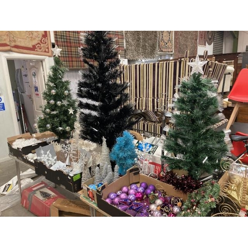 522 - 3 boxed artificial table top Christmas trees (2 with boxes), 2 boxes of tinsel, box of baubles and d... 