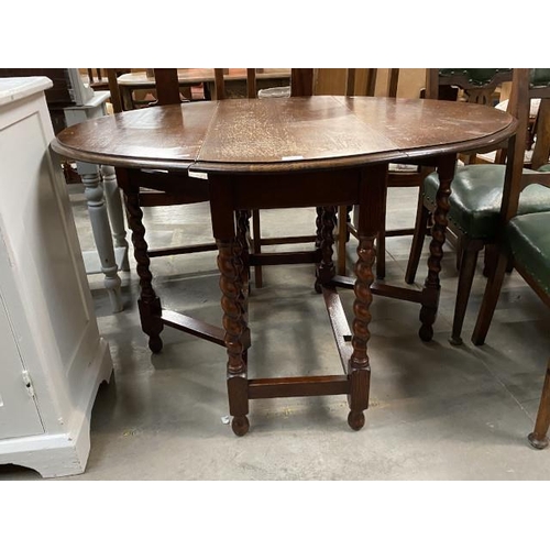 74 - Oak drop leaf table 73H 115W 90d