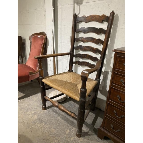 117 - Oak rush seated ladder back carver chair 67W