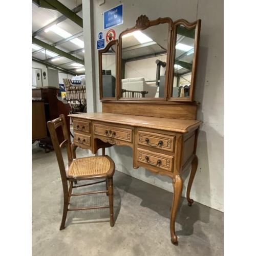 123 - French oak dressing table 171H 120W 48D and a cane seated chair