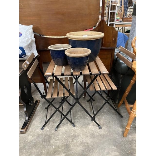 146 - Folding metal and wood table 71H 55W 54D with 2 chairs and 4 glazed plant pots 27 x 38, 23 x 29, 18 ... 