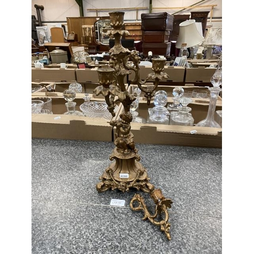 197 - Gilt metal 3 branch cherub candelabra 46cm high (requires repair)