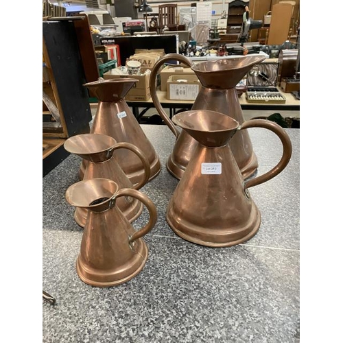 213 - 5 graduated copper jugs 15cm, 17cm, 23cm, 27cm & 30cm high