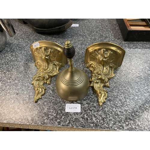 218 - Pair of brass wall brackets and a bell