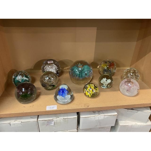 231 - 11 glass paperweights