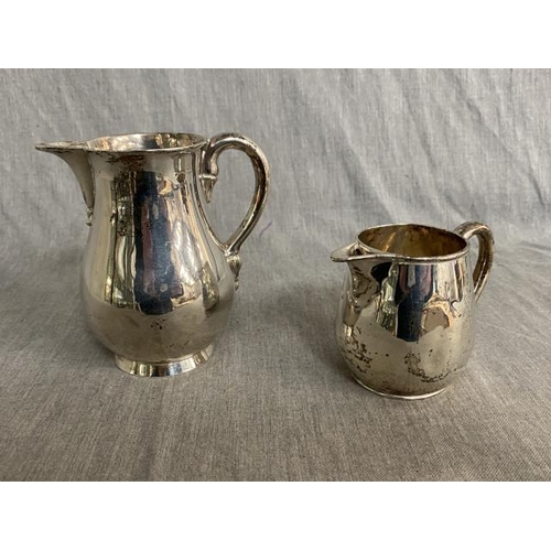 243 - London 1911 D & J Wellby Ltd silver water jug (244g), London 1881 FB Thomas & Co (Francis Boone Thom... 