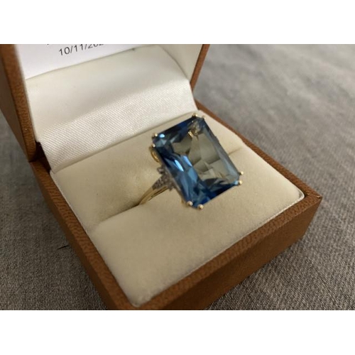 287 - 9ct gold diamond and blue topaz ring (size Q)