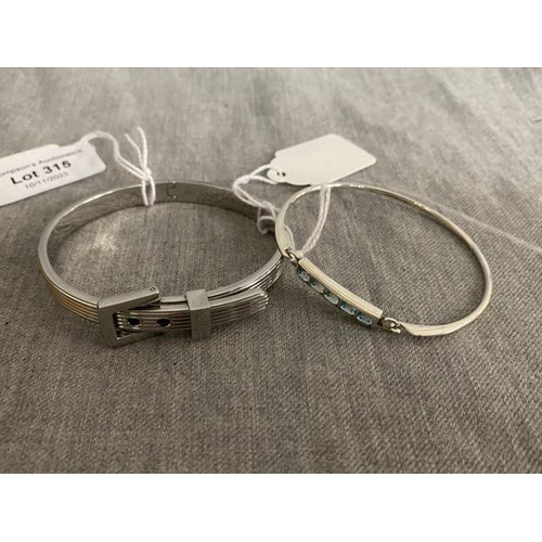 315 - Michael Kors buckle bangle and a 925 silver blue stone set bangle