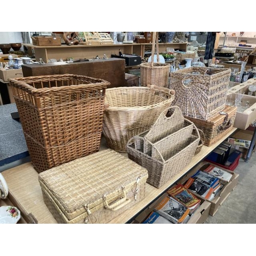 488 - Assorted wicker items including picnic hampers, laundry baskets, bread basket etc