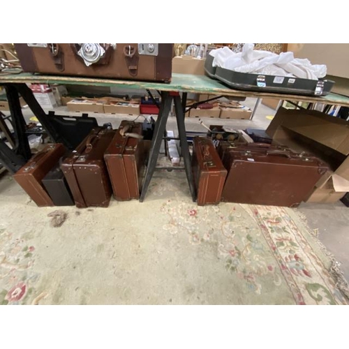 491 - 7 vintage suitcases including leather