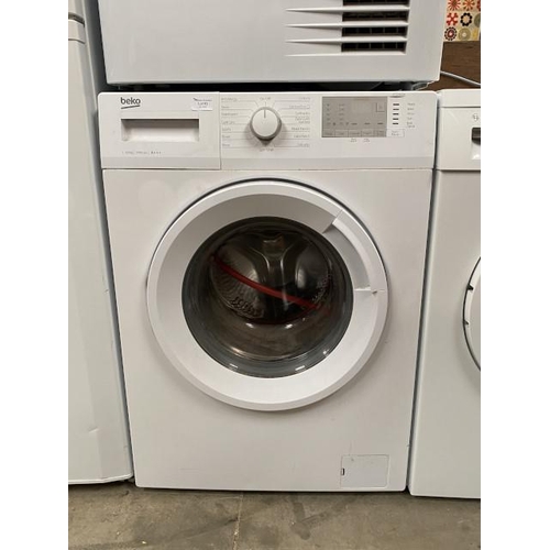 63 - Beko WTG1041B2W washing machine 85H 60W 60D