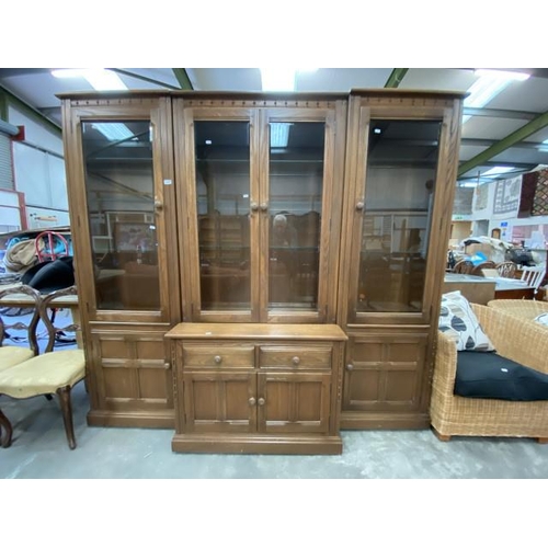 85 - Ercol Golden Dawn display cabinet in 3 sections 197H 215W 45D with internal lighting