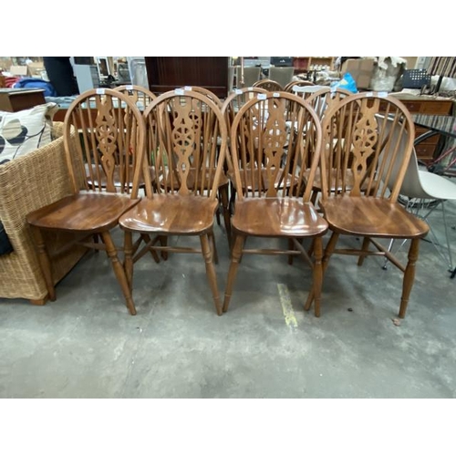 87 - 8 oak wheelback dining chairs 38W