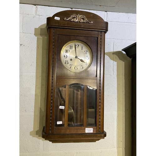 96 - German oak wall clock with pendulum and key, in working order 34 x 70cm