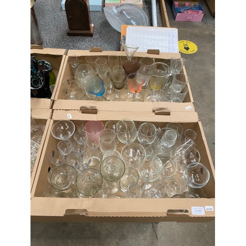 486 - 7 boxes of assorted glassware including decanters, tumblers, sundae dishes, art glass etc