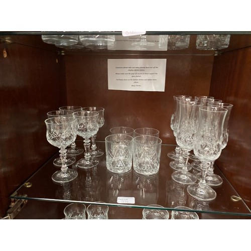 372 - Selection of cut glasses including tumblers, red wine glasses, champagne flutes etc