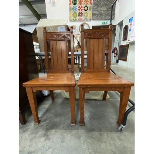 181 - Pair of Victorian pitch pine Gothic hall chairs 45W