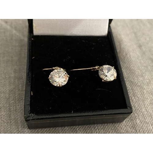 250 - Pair of 9ct gold solitaire drop earrings