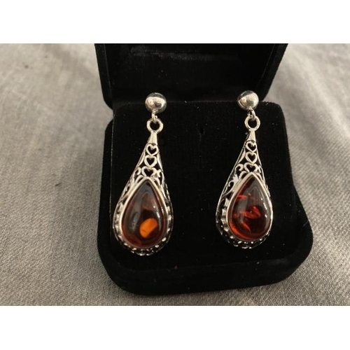 300 - Pair of silver & amber earrings